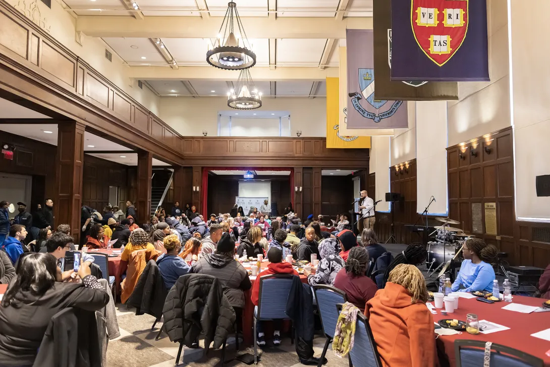 Hall of Flags at Houston Hall at the University of Pennsylvania hosting an event with round tables seated with people