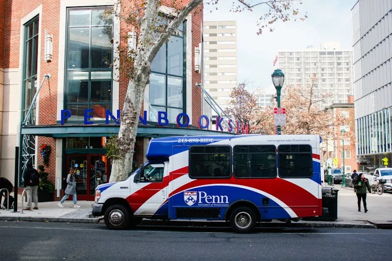 Penn bus in front of bookstore